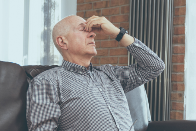 Older man looking depressed