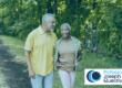 Older couple walking in country